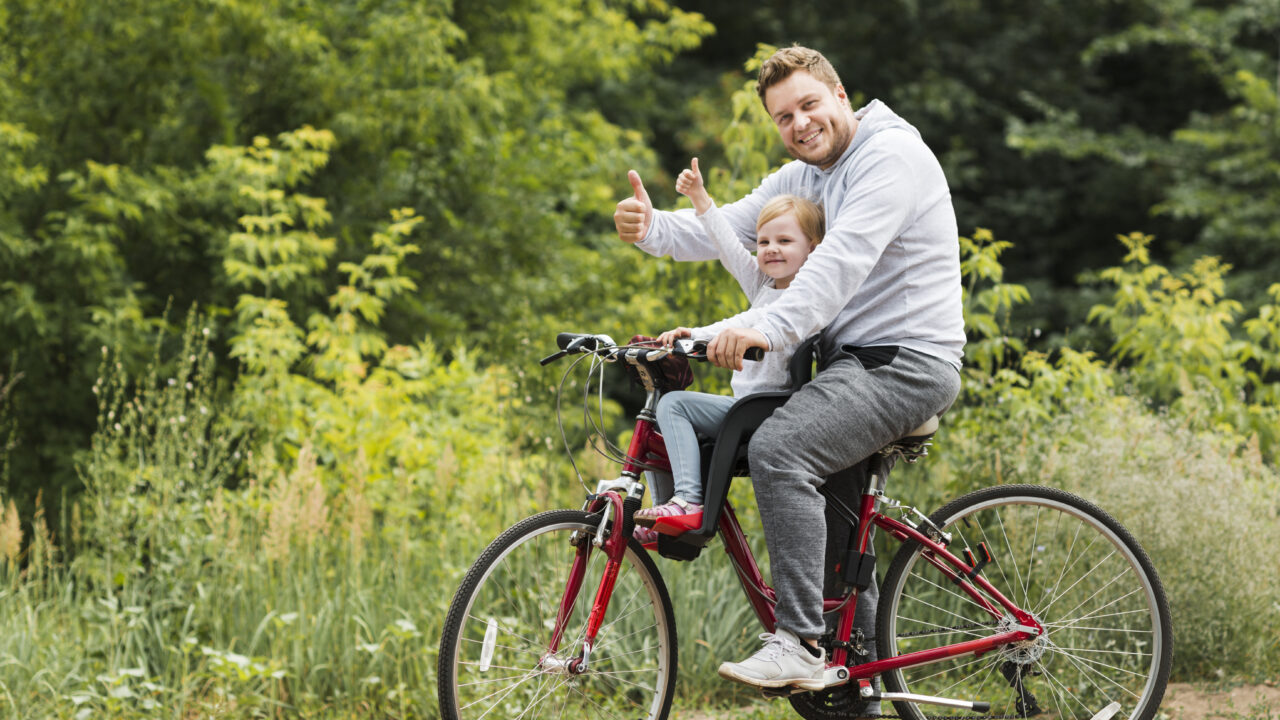 happy-father-daughter-bike